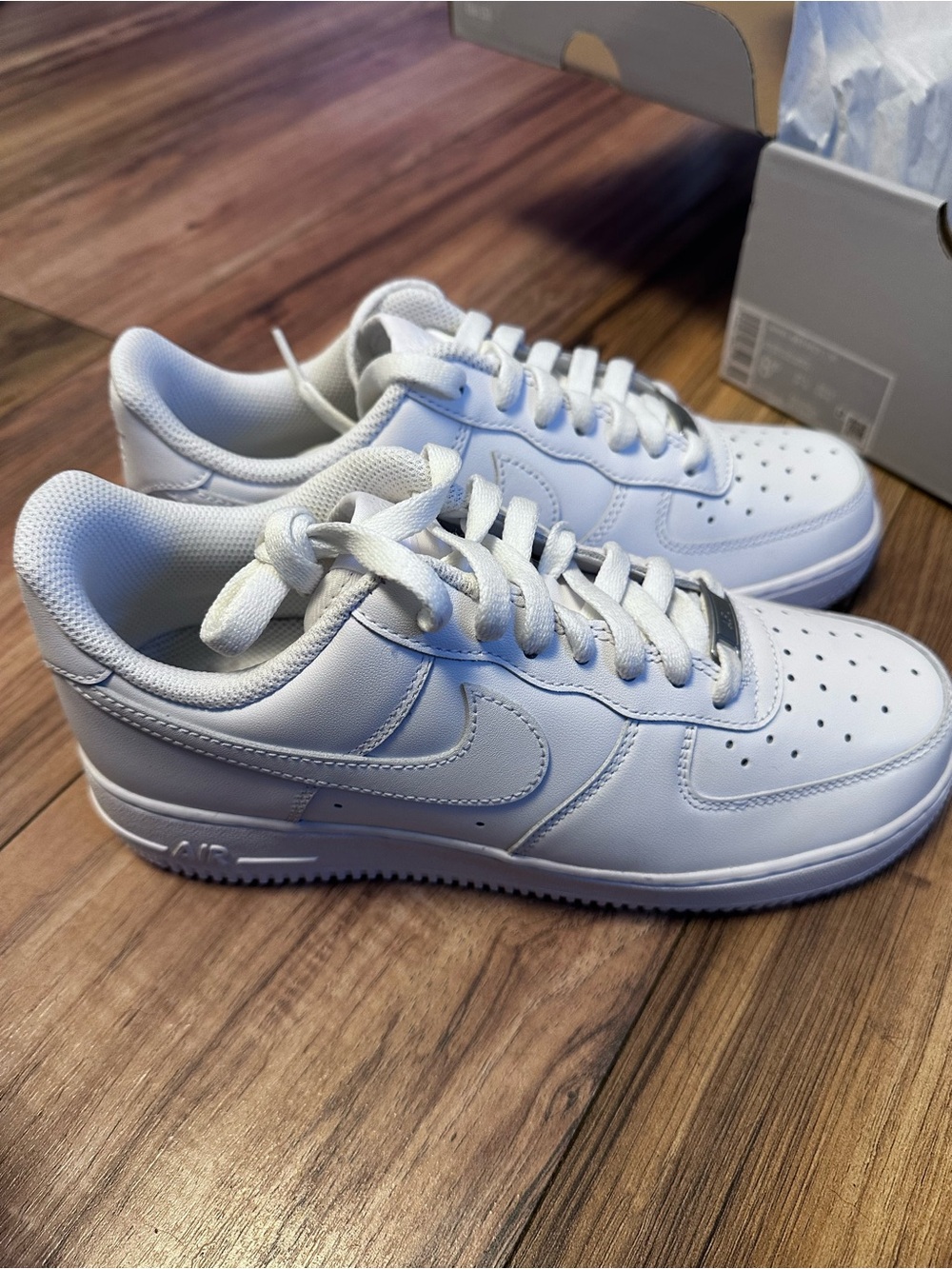 Nike women’s Air Force 1 Low White Leather Sneakers